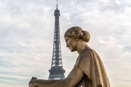 Statue of woman at the Trocadero Eiffel Tower With at backgroundの写真素材