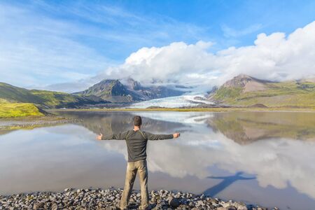 Man enjoying the amazing view in Fjallsarlon glacial lagoon, Icelandの写真素材