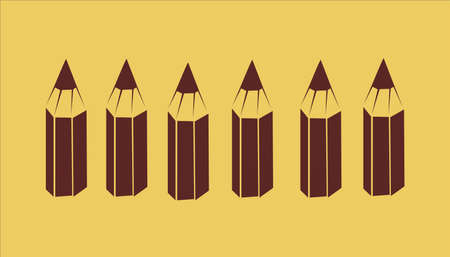 Six short same brown pencils on the pastel beige backgroundの写真素材