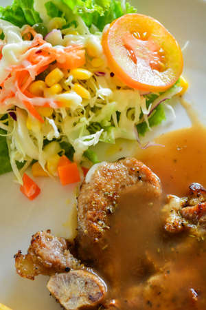 pork steak and saladの写真素材