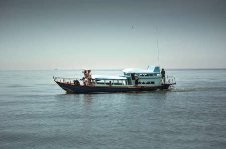 people waching Bryde\'s by fishing boatのeditorial素材