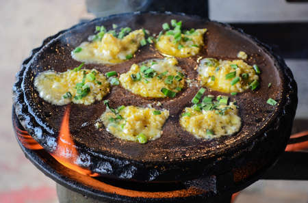 scallop with garlic in hot plateの写真素材