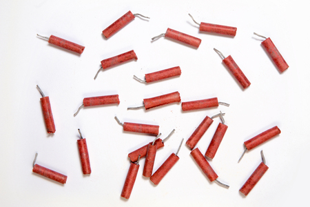 Red Firecrackers isolated on white background の写真素材