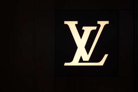 Singapore - October, 2019: Louis Vuitton flagship store logo isolated in blackのeditorial素材