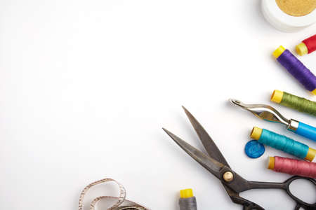 Copyspace frame with sewing tools and accesories isolated on whiteの写真素材