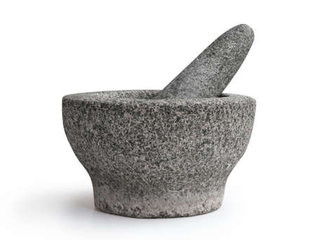 Stone mortar and pestle isolated on white backgroundの写真素材