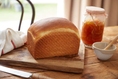 Homemade toaster sourdough bread with citrusy peel fruit jamの写真素材