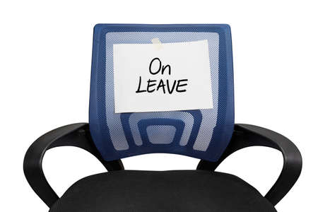 Office chair with a On Leave sign isolated on white backgroundの写真素材