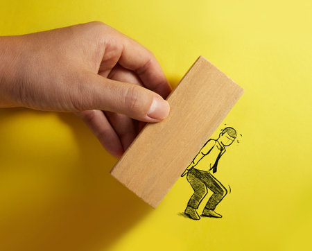 Hand drawn businessman carry a heavy wood block. Concept of stress.の写真素材