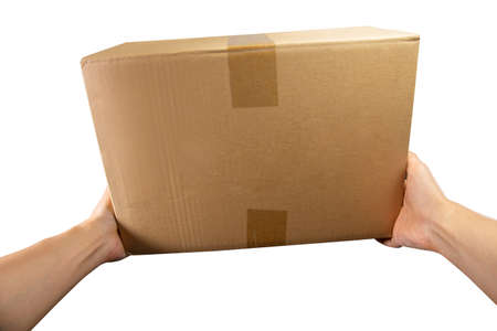 Point of view hand of courier holds the package or Parcel box delivery to the customer isolated on...