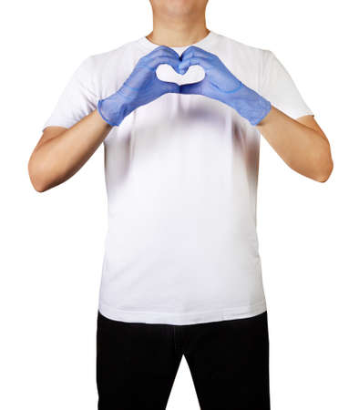 Man hands in latex glove shows the symbol of the heart.の写真素材