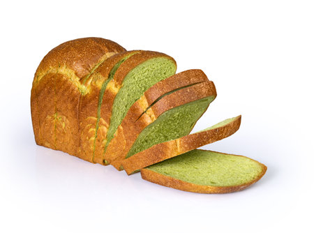 Sliced matcha bread isolated on white background
