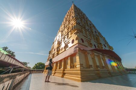 Buddha on Chedi Buddhakhaya, built to mimic the Mahabodhi stupa of Bodhgaya in India, a symbol of Sangklaburi, Kanchanaburi, Thailandの写真素材