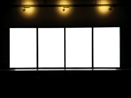 Spot light shining bright on blank space on brick wall with empty window for banner. (With clipping path)の写真素材