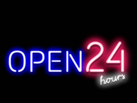 Bar Open 24 hours blue, red and white glowing neon light signboard on dark textured backgroundの写真素材