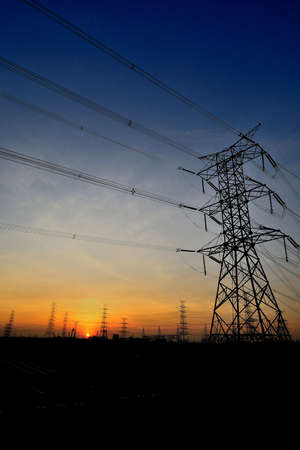 Transmission line at sunsetの写真素材