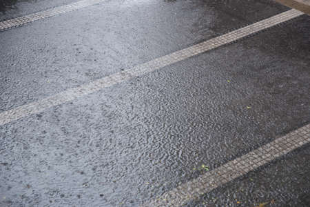 Raining drop on floorの写真素材