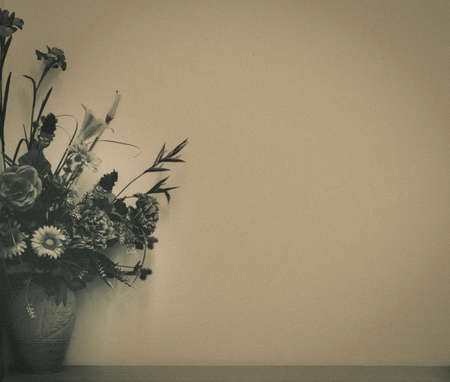 Flower bouquet in ceramic vase with the isolated background (green color vintage style)の写真素材