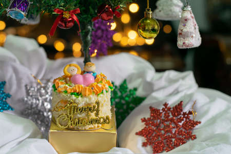 Decorated christmas tree with the bokeh background of round lightの写真素材