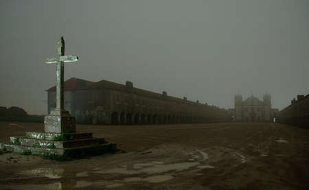 A cross on a mystic night scape, close to a monasteryの写真素材