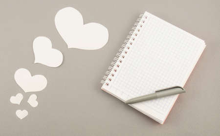 White paper hearts as greeting cards on grey backgroundの写真素材