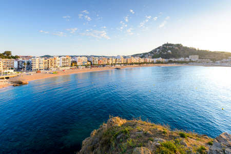 Blanes city and beach from Sa Palomera rock at morning in Spainの写真素材