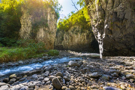 Hiking in a canyon during a sunny day, Bras de La Plain at Reunion Islandの写真素材