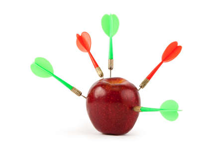 Dart arrows on an apple