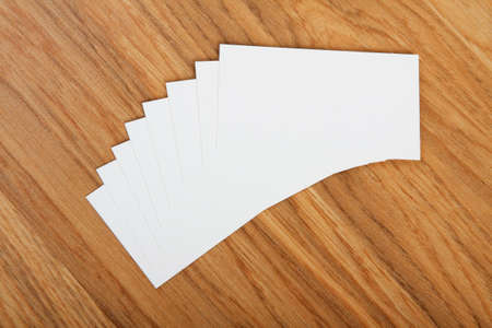identity design, corporate templates, company style, blank business cards on a wooden background
