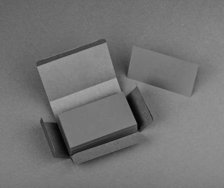 identity design, corporate templates, company style, blank business cards on a gray backgroundの写真素材