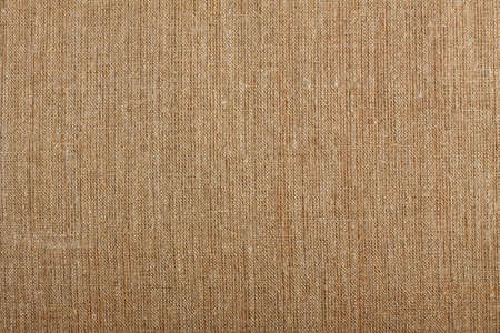 Closeup of brown textured surface, burlap texture background