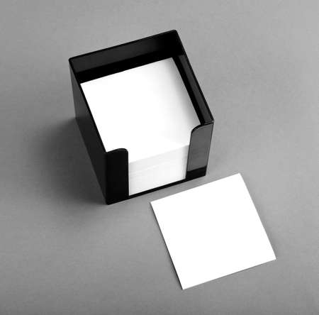 Black leather memo pad holder with blank white memo paperの写真素材