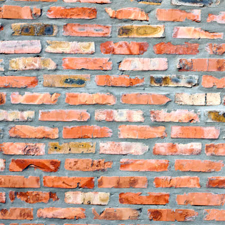 A grungy red brick wall texture, background