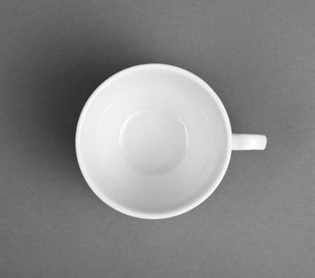 A white espresso cup on gray background, top viewの写真素材