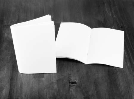 Blank catalog, brochure, book mock up. Empty opened magazine on wooden background