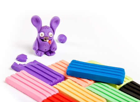 Children's toy made from plasticine on white backgroundの写真素材