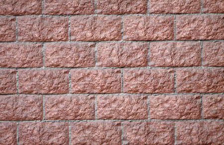 Red brick wall with a gray cement. Background, textureの写真素材