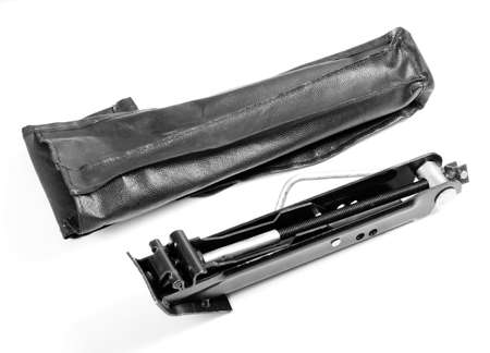 Black car jack isolated over white backgroundの写真素材