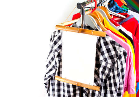 Black Friday shopping sale concept. Sale in a clothing store - discount sign at a clothes rack