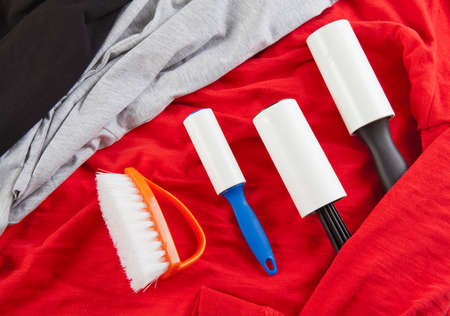 A lint brush used to remove excess fabric and particles from clothの写真素材