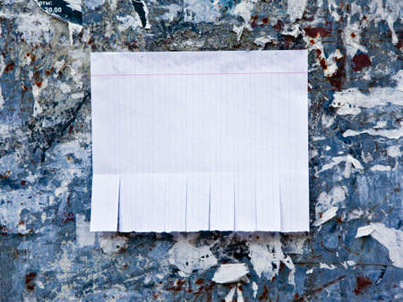 Blank white paper with tear off tabsの写真素材
