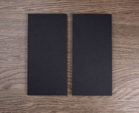 Blank flyer over wooden background to replace your designの写真素材