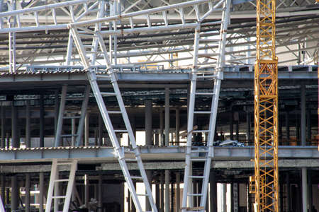 Tower crane builds a house