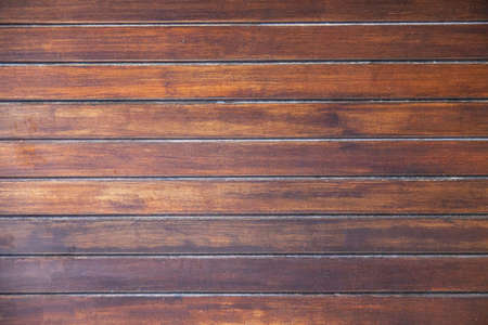 Wooden wall with horizontal planks. Close up of an old wooden fence panelsの写真素材