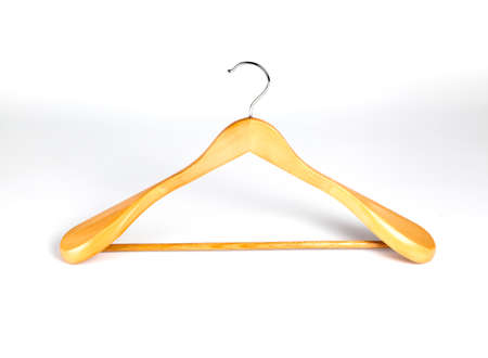 Wooden hanger for clothes on a white backgroundの写真素材