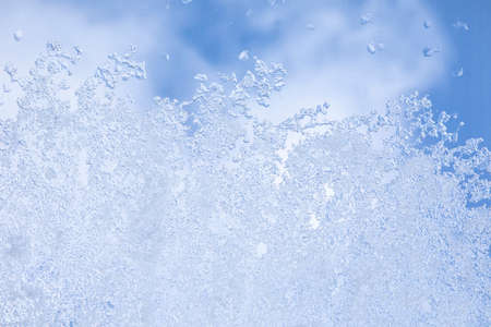 View from the window covered with snowflakesの写真素材