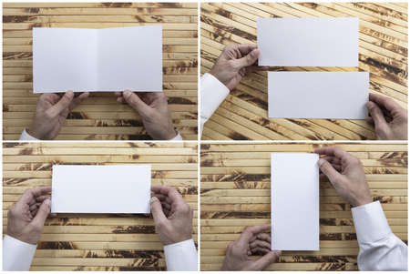 A man holding booklet. Set of identity templateの写真素材