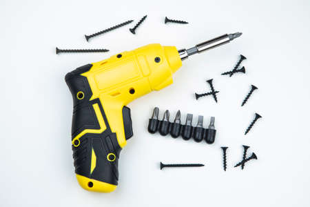 Cordless screwdriver with a drill on a white background