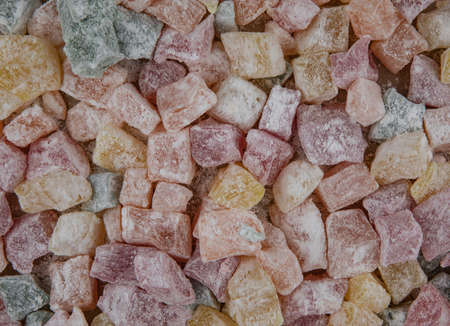 Colored turkish delight sweets coated with icing sugar