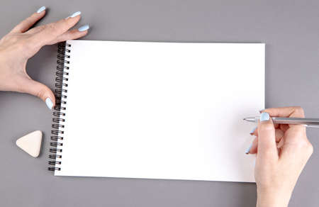 Woman hand with pencil prepare to writing on notebook